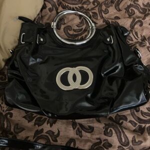 Chic Black Shoulder Bag with Silver Handles